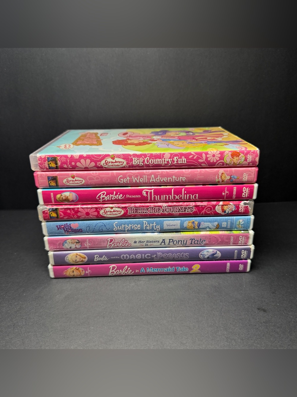Stack of Children's kids DVDs ft. Barbie princess Strawberry Shortcake